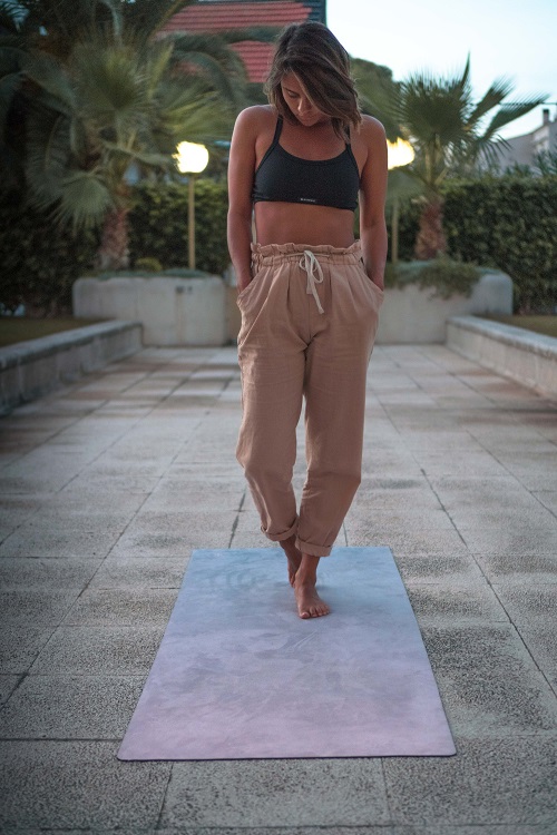 Girl on RR-OM yoga mat